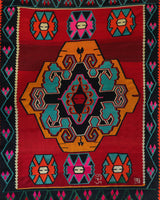 Vintage kilim rug in living room setting, bright colors, wild shaman, soft rug, bold color, Portland, Oregon, rug store, rug shop, local shop, vintage rug, modern kilim, warm colors, antique rug, antique kilim