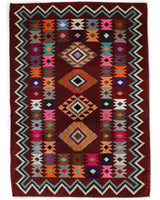 Vintage kilim rug in living room setting, bright colors, wild shaman, soft rug, bold color, Portland, Oregon, rug store, rug shop, local shop, vintage rug, modern kilim, warm colors, antique rug, antique kilim