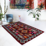 Vintage kilim rug in living room setting, bright colors, wild shaman, soft rug, bold color, Portland, Oregon, rug store, rug shop, local shop, vintage rug, modern kilim, warm colors, antique rug, antique kilim