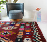 Vintage kilim rug in living room setting, bright colors, wild shaman, soft rug, bold color, Portland, Oregon, rug store, rug shop, local shop, vintage rug, modern kilim, warm colors, antique rug, antique kilim