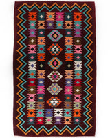 Vintage kilim rug in living room setting, bright colors, wild shaman, soft rug, bold color, Portland, Oregon, rug store, rug shop, local shop, vintage rug, modern kilim, warm colors, antique rug, antique kilim