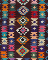 Vintage kilim rug in living room setting, bright colors, wild shaman, soft rug, bold color, Portland, Oregon, rug store, rug shop, local shop, vintage rug, modern kilim, warm colors, antique rug, antique kilim