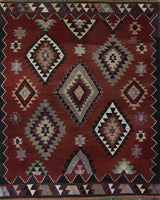 Vintage kilim rug in living room setting, bright colors, wild shaman, soft rug, bold color, Portland, Oregon, rug store, rug shop, local shop, vintage rug, modern kilim, warm colors, antique rug, antique kilim