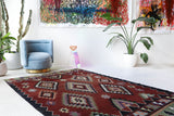 Vintage kilim rug in living room setting, bright colors, wild shaman, soft rug, bold color, Portland, Oregon, rug store, rug shop, local shop, vintage rug, modern kilim, warm colors, antique rug, antique kilim
