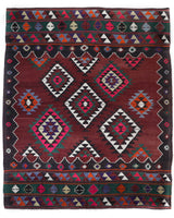 Vintage kilim rug in living room setting, bright colors, wild shaman, soft rug, bold color, Portland, Oregon, rug store, rug shop, local shop, vintage rug, modern kilim, warm colors, antique rug, antique kilim