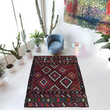 Vintage kilim rug in living room setting, bright colors, wild shaman, soft rug, bold color, Portland, Oregon, rug store, rug shop, local shop, vintage rug, modern kilim, warm colors, antique rug, antique kilim