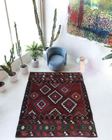 Vintage kilim rug in living room setting, bright colors, wild shaman, soft rug, bold color, Portland, Oregon, rug store, rug shop, local shop, vintage rug, modern kilim, warm colors, antique rug, antique kilim