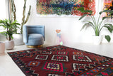 Vintage kilim rug in living room setting, bright colors, wild shaman, soft rug, bold color, Portland, Oregon, rug store, rug shop, local shop, vintage rug, modern kilim, warm colors, antique rug, antique kilim