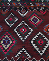 Vintage kilim rug in living room setting, bright colors, wild shaman, soft rug, bold color, Portland, Oregon, rug store, rug shop, local shop, vintage rug, modern kilim, warm colors, antique rug, antique kilim