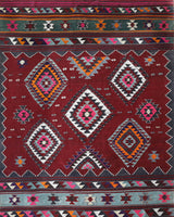 Vintage kilim rug in living room setting, bright colors, wild shaman, soft rug, bold color, Portland, Oregon, rug store, rug shop, local shop, vintage rug, modern kilim, warm colors, antique rug, antique kilim