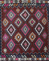 Vintage kilim rug in living room setting, bright colors, wild shaman, soft rug, bold color, Portland, Oregon, rug store, rug shop, local shop, vintage rug, modern kilim, warm colors, antique rug, antique kilim