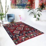 Vintage kilim rug in living room setting, bright colors, wild shaman, soft rug, bold color, Portland, Oregon, rug store, rug shop, local shop, vintage rug, modern kilim, warm colors, antique rug, antique kilim