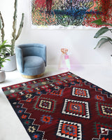 Vintage kilim rug in living room setting, bright colors, wild shaman, soft rug, bold color, Portland, Oregon, rug store, rug shop, local shop, vintage rug, modern kilim, warm colors, antique rug, antique kilim