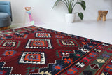 Vintage kilim rug in living room setting, bright colors, wild shaman, soft rug, bold color, Portland, Oregon, rug store, rug shop, local shop, vintage rug, modern kilim, warm colors, antique rug, antique kilim