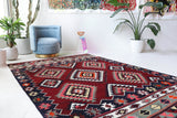 Vintage kilim rug in living room setting, bright colors, wild shaman, soft rug, bold color, Portland, Oregon, rug store, rug shop, local shop, vintage rug, modern kilim, warm colors, antique rug, antique kilimVintage kilim rug in living room setting, bright colors, wild shaman, soft rug, bold color, Portland, Oregon, rug store, rug shop, local shop, vintage rug, modern kilim, warm colors, antique rug, antique kilim