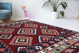 Vintage kilim rug in living room setting, bright colors, wild shaman, soft rug, bold color, Portland, Oregon, rug store, rug shop, local shop, vintage rug, modern kilim, warm colors, antique rug, antique kilim