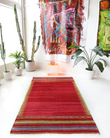 Vintage kilim rug in living room setting, bright colors, wild shaman, soft rug, bold color, Portland, Oregon, rug store, rug shop, local shop, vintage rug, modern kilim, warm colors, antique kilim rug