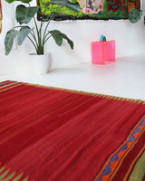 Vintage kilim rug in living room setting, bright colors, wild shaman, soft rug, bold color, Portland, Oregon, rug store, rug shop, local shop, vintage rug, modern kilim, warm colors, antique kilim rug