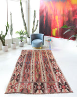 Vintage kilim rug in living room setting, bright colors, wild shaman, soft rug, bold color, Portland, Oregon, rug store, rug shop, local shop, vintage rug, modern kilim, warm colors
