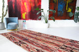 Vintage kilim rug in living room setting, bright colors, wild shaman, soft rug, bold color, Portland, Oregon, rug store, rug shop, local shop, vintage rug, modern kilim, warm colors