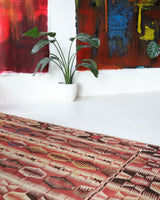 Vintage kilim rug in living room setting, bright colors, wild shaman, soft rug, bold color, Portland, Oregon, rug store, rug shop, local shop, vintage rug, modern kilim, warm colors