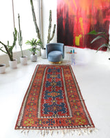 Vintage Turkish runner rug in living room setting, old rug, antique rug, pastel colors, faded colors, Turkish rug, vintage rug, soft rug, Portland, Oregon, rug store, rug shop, local shop