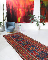 Vintage Turkish runner rug in living room setting, old rug, antique rug, pastel colors, faded colors, Turkish rug, vintage rug, soft rug, Portland, Oregon, rug store, rug shop, local shop