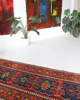 Vintage Turkish runner rug in living room setting, old rug, antique rug, pastel colors, faded colors, Turkish rug, vintage rug, soft rug, Portland, Oregon, rug store, rug shop, local shop