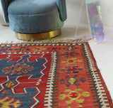 Vintage Turkish runner rug in living room setting, old rug, antique rug, pastel colors, faded colors, Turkish rug, vintage rug, soft rug, Portland, Oregon, rug store, rug shop, local shop