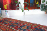 Vintage Turkish runner rug in living room setting, old rug, antique rug, pastel colors, faded colors, Turkish rug, vintage rug, soft rug, Portland, Oregon, rug store, rug shop, local shop