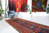 Vintage Turkish runner rug in living room setting, old rug, antique rug, pastel colors, faded colors, Turkish rug, vintage rug, soft rug, Portland, Oregon, rug store, rug shop, local shop