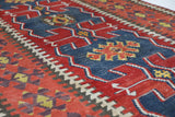 Vintage Turkish runner rug in living room setting, old rug, antique rug, pastel colors, faded colors, Turkish rug, vintage rug, soft rug, Portland, Oregon, rug store, rug shop, local shop