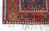 Vintage Turkish runner rug in living room setting, old rug, antique rug, pastel colors, faded colors, Turkish rug, vintage rug, soft rug, Portland, Oregon, rug store, rug shop, local shop