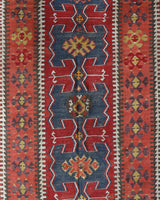 Vintage Turkish runner rug in living room setting, old rug, antique rug, pastel colors, faded colors, Turkish rug, vintage rug, soft rug, Portland, Oregon, rug store, rug shop, local shop