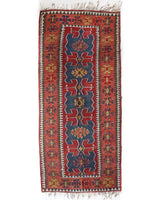 Vintage Turkish runner rug in living room setting, old rug, antique rug, pastel colors, faded colors, Turkish rug, vintage rug, soft rug, Portland, Oregon, rug store, rug shop, local shop