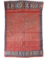 Vintage kilim rug in living room setting, old rug, antique rug, pastel colors, faded colors, Turkish rug, vintage rug, soft rug, Portland, Oregon, rug store, rug shop, local shop, earthy tones, earthy colors, warm colors