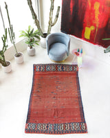 Vintage kilim rug in living room setting, old rug, antique rug, pastel colors, faded colors, Turkish rug, vintage rug, soft rug, Portland, Oregon, rug store, rug shop, local shop, earthy tones, earthy colors, warm colors