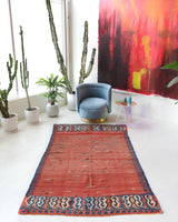 Vintage kilim rug in living room setting, old rug, antique rug, pastel colors, faded colors, Turkish rug, vintage rug, soft rug, Portland, Oregon, rug store, rug shop, local shop, earthy tones, earthy colors, warm colors