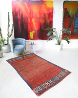 Vintage kilim rug in living room setting, old rug, antique rug, pastel colors, faded colors, Turkish rug, vintage rug, soft rug, Portland, Oregon, rug store, rug shop, local shop, earthy tones, earthy colors, warm colors