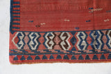 Vintage kilim rug in living room setting, old rug, antique rug, pastel colors, faded colors, Turkish rug, vintage rug, soft rug, Portland, Oregon, rug store, rug shop, local shop, earthy tones, earthy colors, warm colors