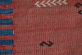 Vintage kilim rug in living room setting, old rug, antique rug, pastel colors, faded colors, Turkish rug, vintage rug, soft rug, Portland, Oregon, rug store, rug shop, local shop, earthy tones, earthy colors, warm colors