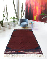 Vintage kilim rug in living room setting, bright colors, wild shaman, soft rug, bold color, Portland, Oregon, rug store, rug shop, local shop, vintage rug, modern kilim, warm colors, antique rug, antique kilim