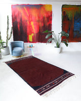 Vintage kilim rug in living room setting, bright colors, wild shaman, soft rug, bold color, Portland, Oregon, rug store, rug shop, local shop, vintage rug, modern kilim, warm colors, antique rug, antique kilim
