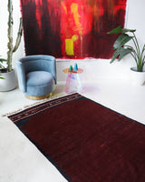Vintage kilim rug in living room setting, bright colors, wild shaman, soft rug, bold color, Portland, Oregon, rug store, rug shop, local shop, vintage rug, modern kilim, warm colors, antique rug, antique kilim