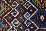Vintage kilim rug in living room setting, bright colors, wild shaman, soft rug, bold color, Portland, Oregon, rug store, rug shop, local shop, vintage rug, modern kilim, warm colors, antique rug, antique kilim