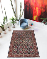 Vintage Turkish rug in a living room setting, pile rug, Turkish rug, vintage rug, portland, rug shop, bright colors, wild shaman, soft rug, bold color, Portland, Oregon, rug store, rug shop, local shop, antique rug