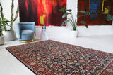 Vintage Turkish rug in a living room setting, pile rug, Turkish rug, vintage rug, portland, rug shop, bright colors, wild shaman, soft rug, bold color, Portland, Oregon, rug store, rug shop, local shop, antique rug