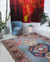 Vintage Turkish rug in living room setting, old rug, antique rug, pastel colors, faded colors, Turkish rug, vintage rug, soft rug, Portland, Oregon, rug store, rug shop, local shop