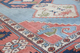 Vintage Turkish rug in living room setting, old rug, antique rug, pastel colors, faded colors, Turkish rug, vintage rug, soft rug, Portland, Oregon, rug store, rug shop, local shop