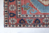 Vintage Turkish rug in living room setting, old rug, antique rug, pastel colors, faded colors, Turkish rug, vintage rug, soft rug, Portland, Oregon, rug store, rug shop, local shop
